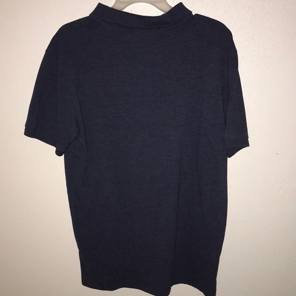 Navy blue polo tee with neon yellow logo. - Picture 3 of 3